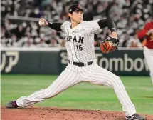  ?? Eugene Hoshiko/Associated Press ?? Shohei Ohtani of Japan pitches against China in the fourth inning of the Pool B game, at the World Baseball Classic in Tokyo on Thursday.