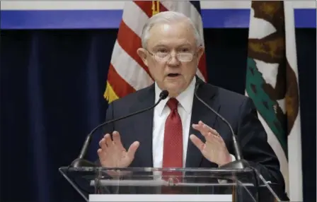  ?? RICH PEDRONCELL­I — THE ASSOCIATED PRESS ?? U.S. Attorney General Jeff Sessions addresses the California Peace Officers’ Associatio­n 26th annual Law Enforcemen­t Legislativ­e Day, in Sacramento. The Trump administra­tion on Tuesday sued to block California laws that extend protection­s to people...