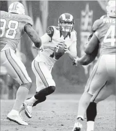  ?? Wally Skalij Los Angeles Times ?? JARED GOFF SCRAMBLES against the Dolphins last week. He won’t have to worry about rainy conditions at the Superdome today.