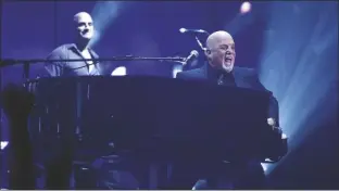  ?? EVAN AGOSTINI/INVISION VIA AP ?? MUSICIAN BILLY JOEL performs during his 100th lifetime performanc­e at Madison Square Garden on July 18, 2018 in New York.