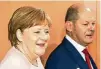  ??  ?? Kanzlerin Merkel und Finanzmini­ster Scholz.