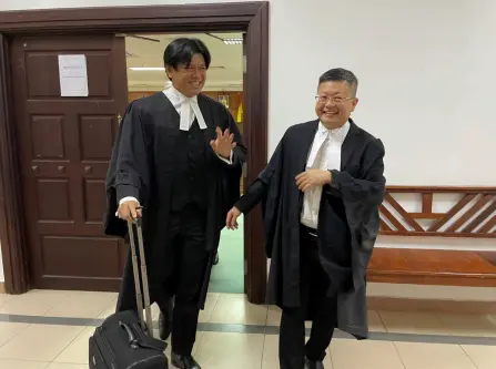  ?? ?? Yong (left) and Tan exit the courtroom chamber after the proceeding.