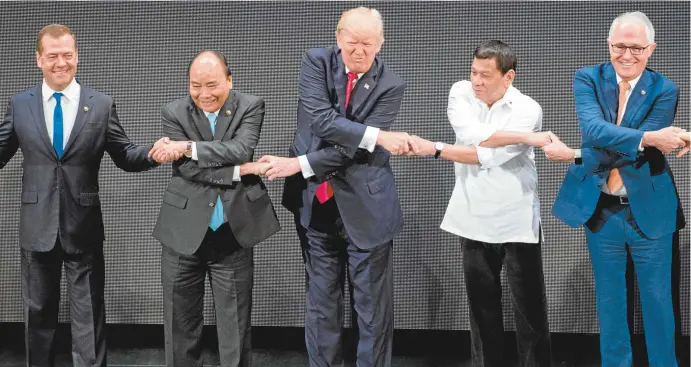  ??  ?? Russian Prime Minister Dmitry Medvedev, Vietnamese Prime Minister Nguyen Xuân Phúc, US President Donald Trump, Philippine President
Rodrigo Duterte and Australian Prime Minister Malcolm Turnbull in Manila this week.