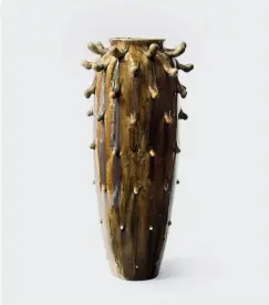  ??  ?? Above — With the Tapered Frilled vessel (2018), Johnson takes a classic form and applies surface decoration­s that sometimes resemble insect antennae.