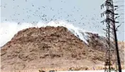  ?? PIC/NAVEEN SHARMA ?? Smoke billows from the garbage hill near Mukundpur dumping ground on Wednesday. Waste keeps catching fire due to methane emissions