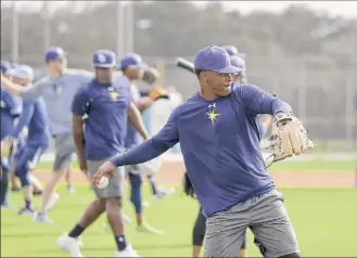  ?? John Bazemore / Associated Press ?? The Tampa Bay Rays, who made it to the World Series in 2020, intend to open spring training camp as scheduled in mid-february, according to manager Kevin Cash.