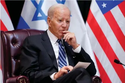  ?? Photograph: Evan Vucci/AP ?? ‘It’s the price of waging a war,’ Biden said two weeks into the Israeli bombardmen­t.