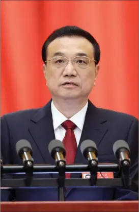  ?? FENG YONGBIN / CHINA DAILY ?? Premier Li Keqiang gives the Government Work Report on March 5.