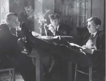  ??  ?? 0 Schoolboys in a sanctioned smoking room intended to put them off in 1962, as a report on the habit was published