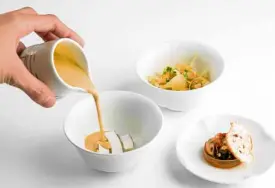  ??  ?? Fennel jelly served with mussel, tomato concasse, coriander and crispy baguette. Accompanie­d with fennel salad and mussel veloute poured in diced white ham with green apple and sliced coconut