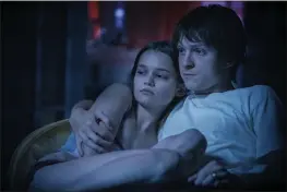  ??  ?? Ciara Bravo and Tom Holland in a scene from “Cherry.”