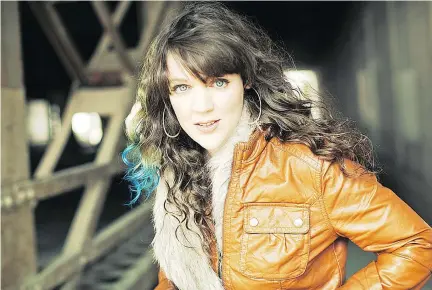  ??  ?? St. John’s-based folksinger Amelia Curran wanted her latest work “to be a team effort,” she tells Lynn Saxberg.