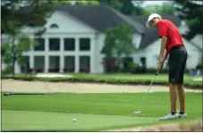  ?? Jeremy Stewart / Rome News-Tribune ?? Hogan Ingram of Rome watches his putt on the No. 8 green during the first round of the AJGA Rome Junior Classic on Saturday at Coosa Country Club.