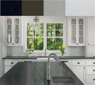  ??  ?? ABOVE A kitchen island and countertop featuring the Verace Marquina surface from Aurastone OPPOSITE PAGE The River de blanc quartz surface from Aurastone features marblelike veining