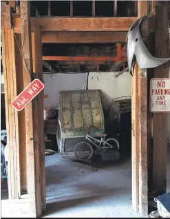  ?? Photo by LiPo Ching ?? The meat rail: Josh’s body was found hanging from this metal bar. The medical examiner, who was about the same size as Josh, tested her own weight on the bar.