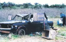  ?? CONTRIBUTE­D ?? The old Lada, seen in a photo from 20 years ago, is where Jim Mcgrath slept in the summertime on the outskirts of Patrick’s Cove. He placed pieces of plywood in the windows slots after the glass broke over the previous winter. Family members gathered his belongings to keep safe for him after he went missing, hoping he would be found safe.