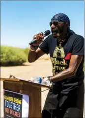  ?? OSUNA PHOTO ?? Black Lives Matter Imperial Valley Chapter Coordinato­r Hilton Smith addresses the crowd in attendance on the importance of keeping migrant families together during Imperial Valley Social Justice Committee’s peaceful rally held Saturday outside the Imperial Regional Detention Facility in Calexico. VINCENT