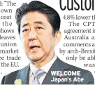  ??  ?? WELCOME Japan’s Abe