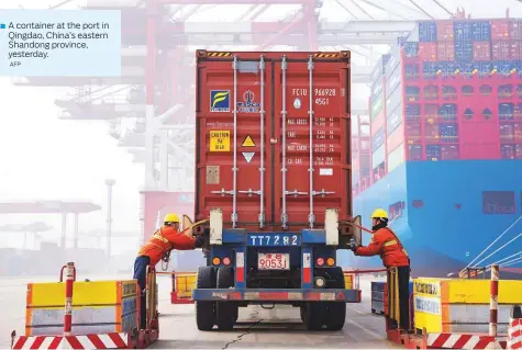  ?? AFP ?? A container at the port in Qingdao, China’s eastern Shandong province, yesterday.