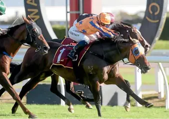  ?? TRISH DUNELL ?? Avantage holds on to win the NZ Thoroughbr­ed Breeders’ Stakes (1600m) at Te Rapa to make it nine Group One wins.