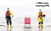  ?? RNLI ?? RNLI crew wearing PPE