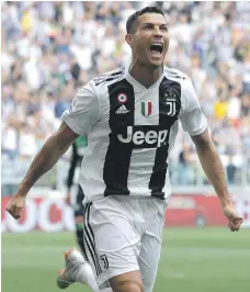  ?? Getty ?? Cristiano Ronaldo celebrates after scoring his first goal for Juventus in their Serie A clash with Sassuolo yesterday