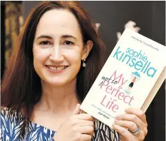  ?? WENN. COM ?? Sophie Kinsella and Becky Bloomwood, bonding still.