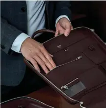  ??  ?? CLASSIFIED PORTFOLIO Lor designed Faire Leather Co’s Bond Travel Briefcase with multiple compartmen­ts and features to keep his belongings organised.