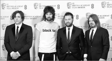  ?? — Reuters file photo ?? Kasabian pose backstage after performing at the Bafta awards ceremony in London on Feb 8, 2015.