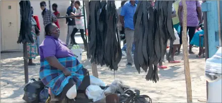  ?? Photo: Nampa ?? Uncertaint­y… One of the street vendors at Rundu.