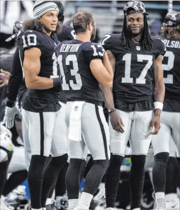  ?? Heidi Fang Las Vegas Review-journal @Heidifang ?? With Davante Adams (No. 17) joining a receiving corp that includes Mack Collins and Hunter Renfrow (13), bettors are optimistic about the Raiders’ chances.