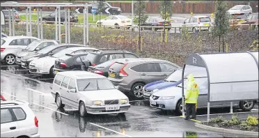  ?? ?? A packed car park on the store’s opening weekend in November 2013