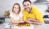  ?? ?? Miguel Maestre and his daughter Claudia bake a Basque cheesecake.