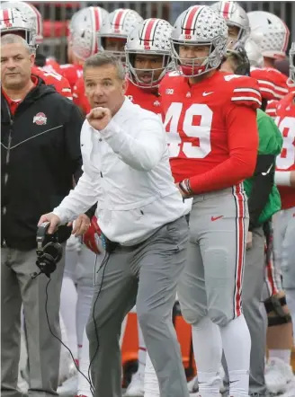  ?? JAY LAPRETE/AP ?? Gus Johnson portrayed Ohio State coach Urban Meyer as the victim in the Zach Smith scandal.