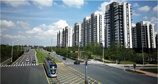  ??  ?? A tramcar runs along the extended Tram Line 1 in Suzhou, a city in China’s eastern province of Jiangsu on August 18, 2018. Suzhou high-tech zone has become a national bellwether in tramcar operation.