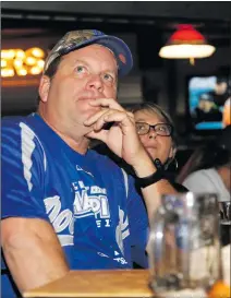  ?? Nikolas Samuels/The
Signal ?? Kirk Whisman looks concerned during the World Series game at Schooners Patio Grille in Santa Clarita on Wednesday.