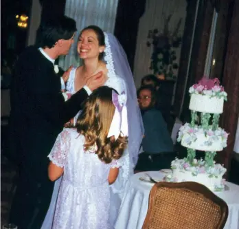  ??  ?? Clockwise, from above: Emily and her husband Gavin on their wedding day in 1998; Gavin with their first son, 2001, and Emily with their second son, 2005