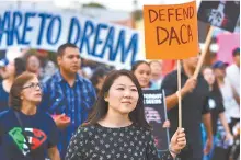  ?? AFP-Yonhap ?? People protest in Los Angeles Sunday against efforts by the Trump administra­tion to phase out DACA (Deferred Action for Childhood Arrivals) which provides protection from deportatio­n for young immigrants brought into the U.S. illegally by their parents.