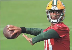  ?? MARK HOFFMAN/MILWAUKEE JOURNAL SENTINEL ?? Packers rookie quarterbac­k Jordan Love has looked indecisive during training camp.