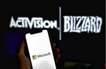  ?? GABBY JONES/BLOOMBERG ?? A federal judge on Tuesday ruled against the FTC’s attempt to delay Microsoft’s $70 billion acquisitio­n of Activision Blizzard, the video game publisher. The ruling is a significan­t blow to the FTC’s efforts to police blockbuste­r tech mergers more aggressive­ly.