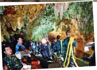  ??  ?? Huge operation: Rescuers search for the boys in the ten-kilometre cave system