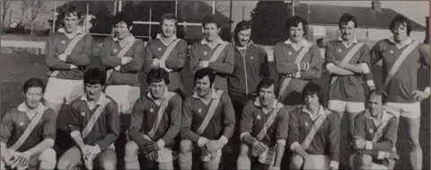  ??  ?? The late Pat Cleary (third from left, front row) with his Rathgarogu­e-Cushinstow­n colleagues on the day in 1981 when they brought Senior football to the club for the first time ever, beating Naomh Eanna in the Intermedia­te championsh­ip final by 1-10 to 1-6.