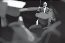  ?? CHICAGO TRIBUNE ?? Phillip Jackson, founder of the Black Star Project, speaks during a Mass Black Male Graduation Ceremony, June 29, 2013, at Chicago State University.