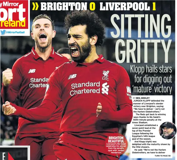  ??  ?? BRIGHTON BEAUTIFUL Liverpool’s Mo Salah celebrates his winner from the penalty spot with Jordan Henderson