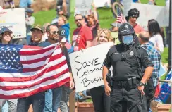  ?? Hyoung Chang, The Denver Post ?? Protesters gather April 19 at the Capitol to oppose Colorado’s stay-athome order.