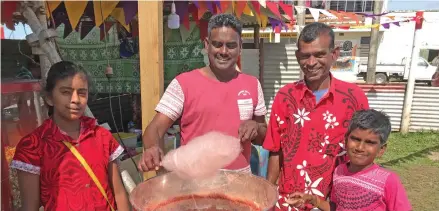  ?? Photo: Shratika Naidu ?? From left: Rastika Narayan with her father Pranil Narayan, uncle Yeswan Sharma and brother Pranit Narayan during the opening of three days carnival to mark the 143rd Girmit Day at Subrail Park in Labasa on May 12, 2022.