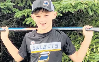  ?? KATHY JOHNSON ?? Nine year old hockey player Jase Hallett, Cape Sable Island, is lacing up this summer with the 2014 Nova Scotia Selects AAA squad, who will be the only Canadian team playing in the CCM Summer Invitation­al Tournament on August 4-6 in Boston.