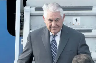  ?? IVAN SEKRETAREV/THE ASSOCIATED PRESS ?? U.S. Secretary of State Rex Tillerson steps out of a plane upon arrival in Moscow’s Vnukovo airport, Russia, on Tuesday. Tillerson is due to meet with Russian Foreign Minister Sergey Lavrov on Wednesday.