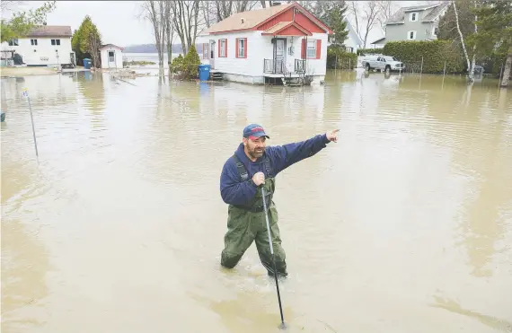  ?? THE CANADIAN PRESS/FILES ?? About $95 million of federal funding went to flood mitigation projects in the country, but another $89 million in earmarked funding was not allocated.