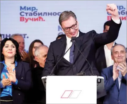  ?? ANTONIO BRONIC / REUTERS ?? Serbian President Aleksandar Vucic cheers after he was projected to win reelection by a landslide on April 3. Vucic declared the results of the vote a victory not only in the presidenti­al, but also the parliament­ary elections.